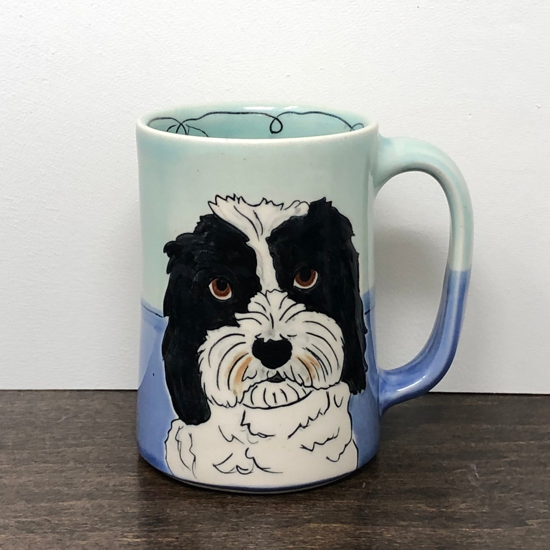 Custom mug with a dog in Aqua and Blue glaze