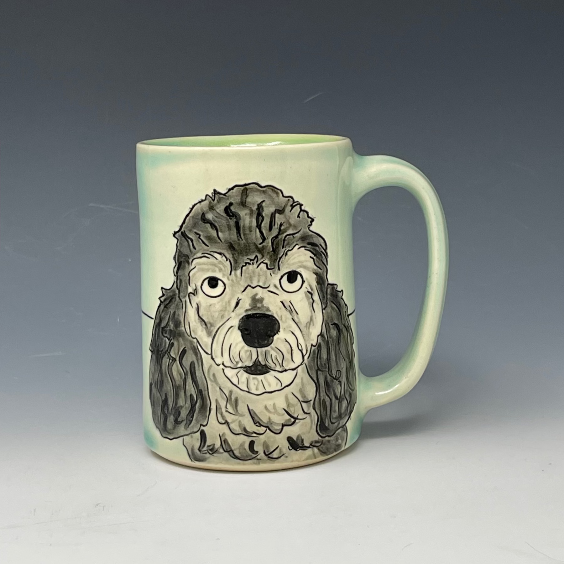 handmade mug with custom drawing of a poodle