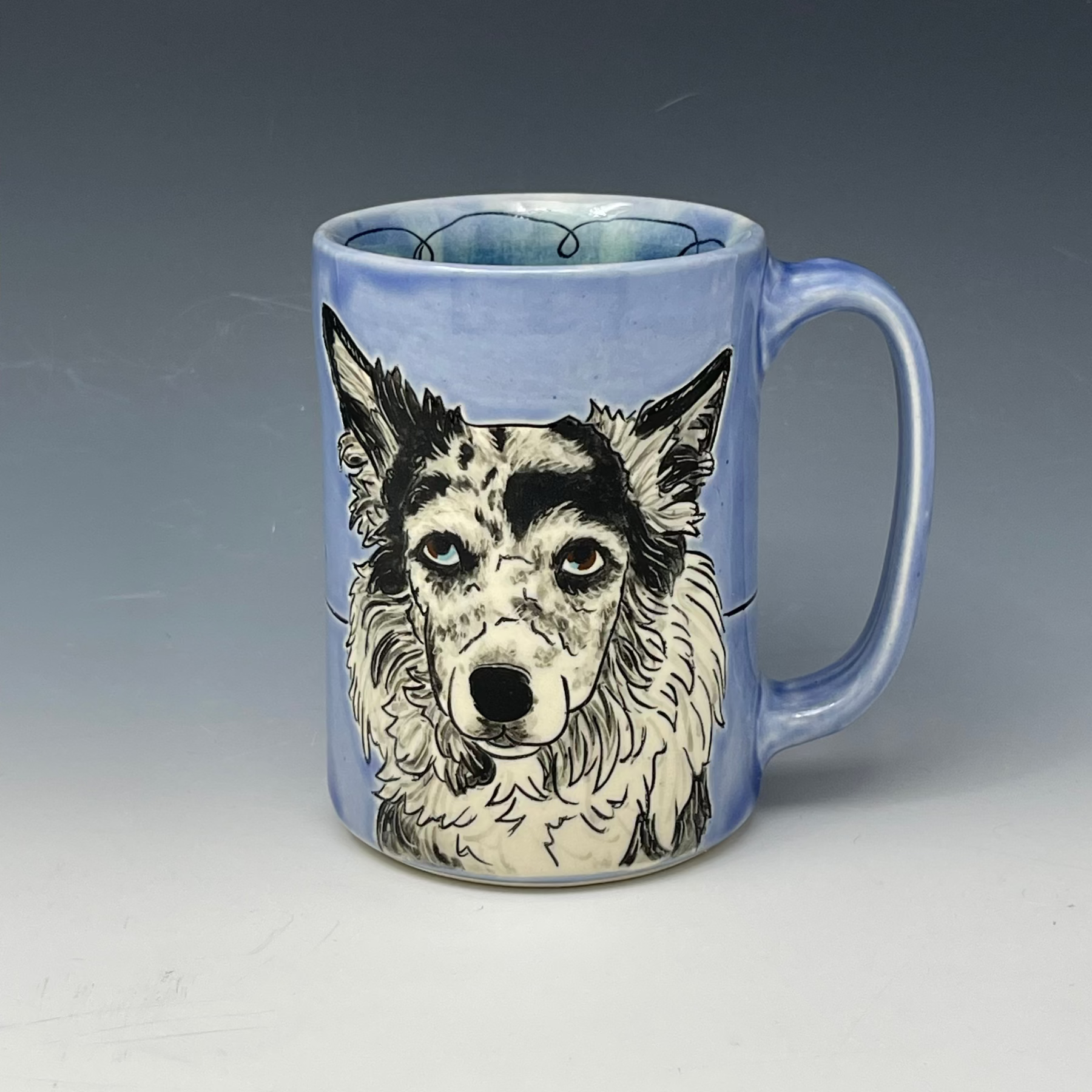 handmade mug with drawing of a border collie dog